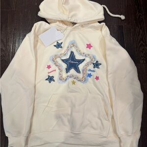 Cream Hoodie with Star Design